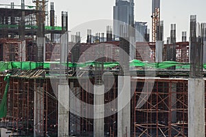 Construction site with crane and building  Building construction site  show structure steel bar and cement.