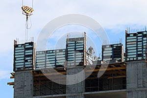 Construction site with crane and man works