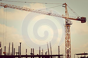 Construction site with crane over a building