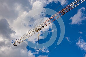Construction site with cranes with blue sky