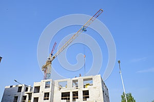 Construction site, cranes, building a house