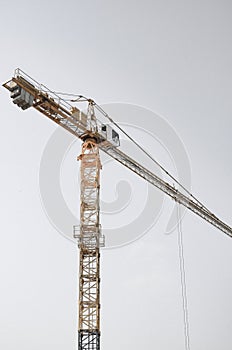 Construction site with cranes building new house