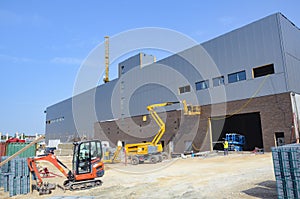 Construction site cranes and heavy machinery