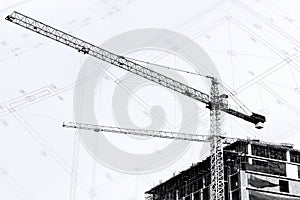 Construction site with cranes on silhouette background