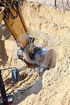 Construction site digger, excavator