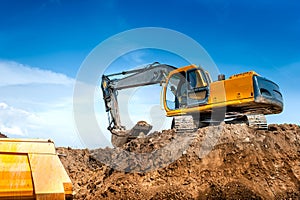 Construction site digger, excavator and dumper truck. industrial