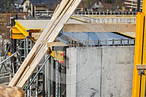 Construction Site Featuring Concrete Walls and Scaffolding Structures photo