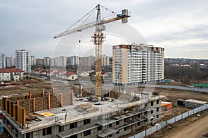 Construction of Multi-Storey Residential Building with Crane photo