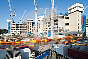 Construction site with a few cranes photo