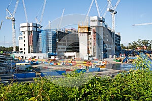 Construction site with a few cranes at final stage photo