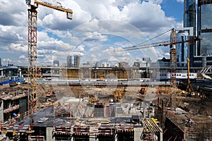 Construction site with foundation pit for monolithic reinforced skyscraper