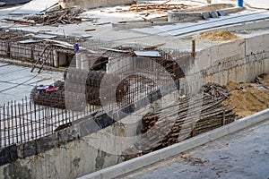 Construction site with foundation pit for monolithic reinforced skyscraper. Monolithic slab foundation and concrete