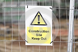 Construction site health and safety message rules sign board signage on fence boundary