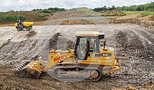 Construction Site with heavy excavating machinery