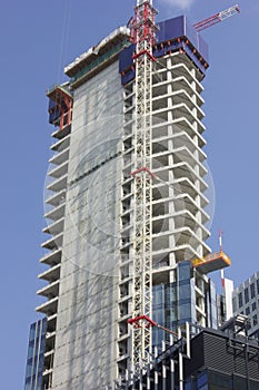 Construction of a skyscraper skyscraper in the city center photo