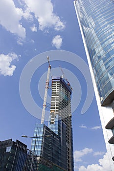 Construction of a skyscraper skyscraper in the city center photo