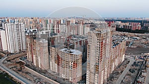 Construction site with highrise buildings and cranes