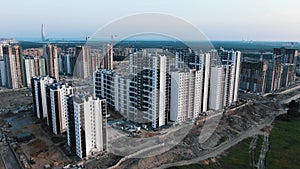 Construction site with highrise buildings and cranes