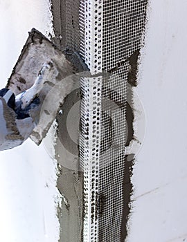 Construction site - Installing external insulation.
