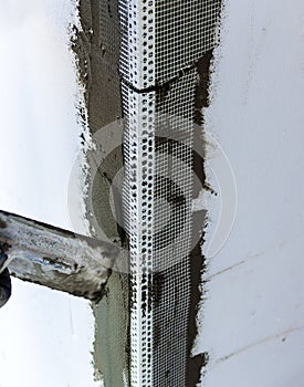 Construction site - Installing external insulation.