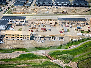 Construction site with a lot of trucks and workers