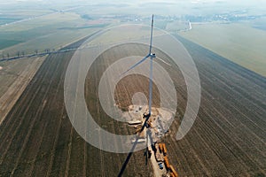 Construction site near windmill turbine, Wind generator installing