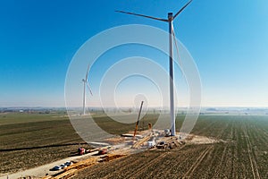 Construction site near windmill turbine, Wind generator installing