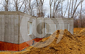 The construction site of a new home poured foundation