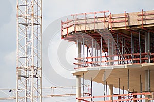 Construction site with a new modern building made with concrete as city development and futuristic architecture is the workplace