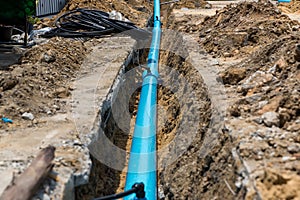 Construction site with new Water Pipes in the ground. sewer pipes to repair or restore in street city