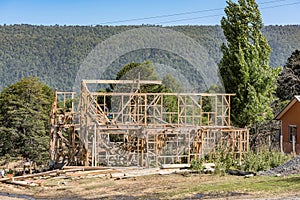 Construction site of a new wooden house, Villa Pehuenia, Argentina photo