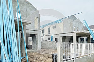 Construction site of property projects during construction show precast housing structure with roof and floor materials. Image use