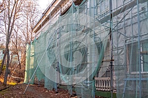 Construction site restoration work on the renovation of the old facade of the building