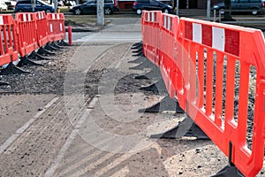 Construction site and safety barriers. Road repair and safety. Trafic lights and crosswalk