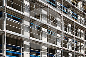 Construction site - scaffolding on building facade