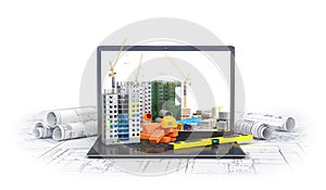 Construction site on the screen of a laptop computer, skyscraper, drawing plan, building materials