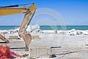 Construction site by the sea for the realization of an embankmen