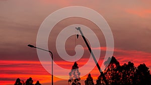 Construction site  silhouette on sunset background