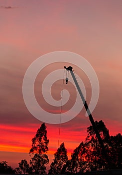Construction site  silhouette on sunset background