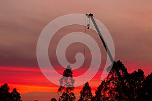 Construction site  silhouette on sunset background