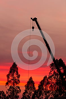 Construction site  silhouette on sunset background