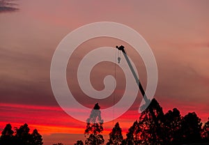 Construction site  silhouette on sunset background