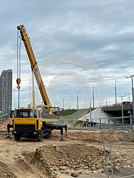 Construction site. Small cement factory, Truck crane and other engineering motor vehicle