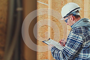 Construction Site Supervisor Engineer Making Proper Documentation on a Site