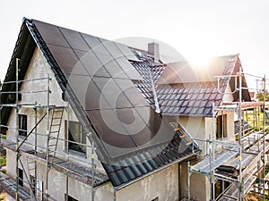 Construction site of a sustainable single family house with solar panels