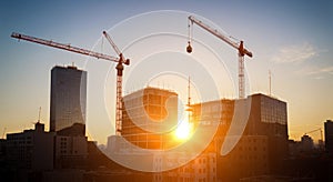 Construction site with tower crane. Construction of residential buildings. Panoramic view of construction of skyscrapers