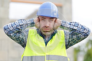 construction suffering from noise pollution on building site