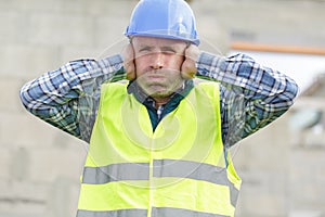 construction suffering from noise pollution on building site