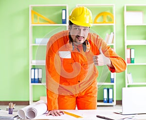 Construction supervisor planning new project in office