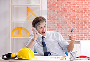 Construction supervisor working on blueprints